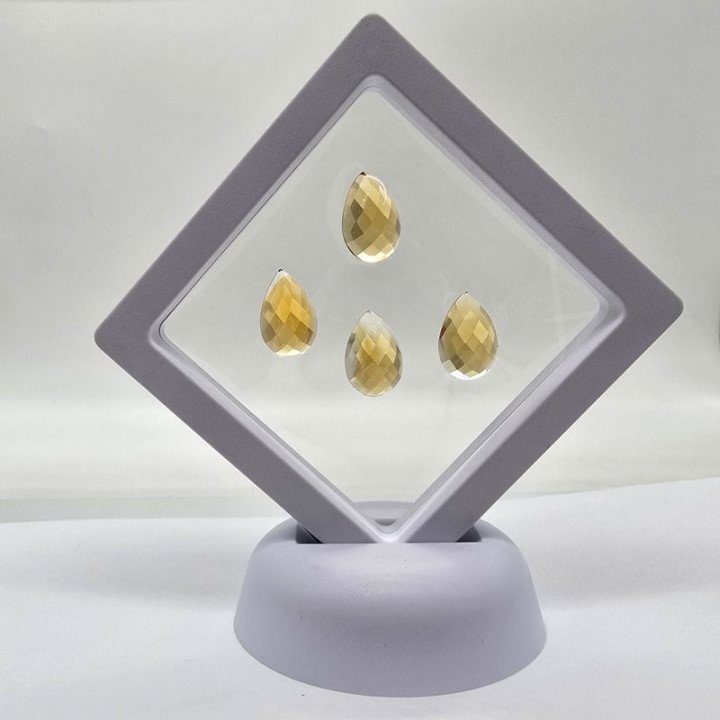 Lot with 4 Pear-Cut Citrines 10x15 mm - 25.30 ct
