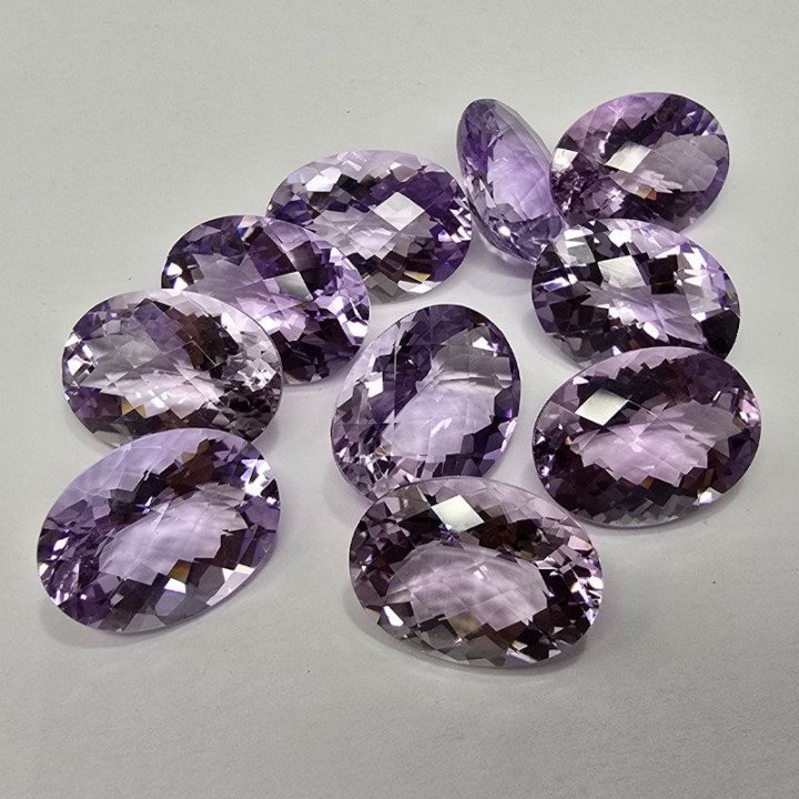 Lot of 9 Oval-Cut Amethysts 12 x 16 mm - 72.69 ct
