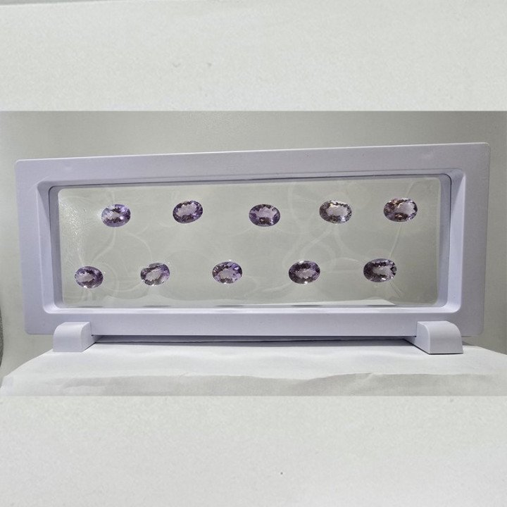 Lot of 9 Oval-Cut Amethysts 12 x 16 mm - 72.69 ct
